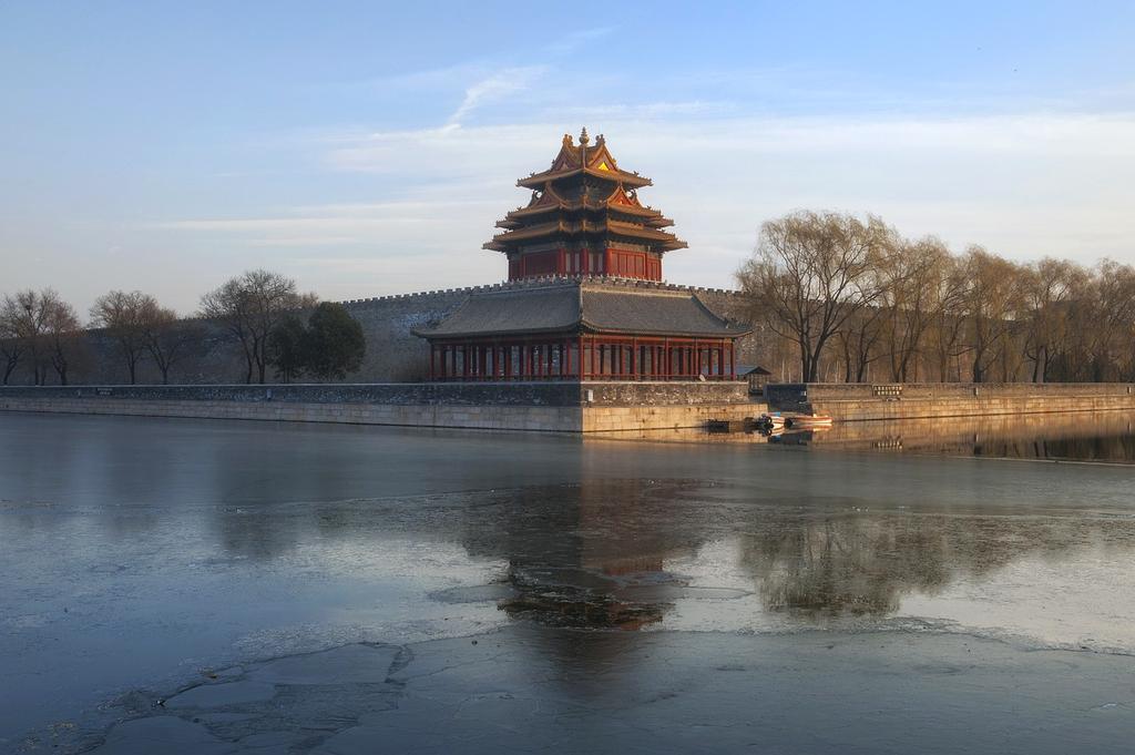 Cozy morning corner with warm light and cushions